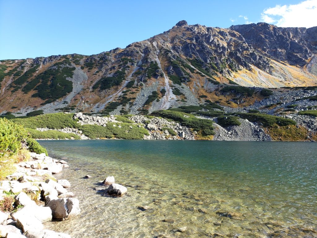 Alpine lake in Dolina Piece Stawow, one fo the best fall hikes in Poland