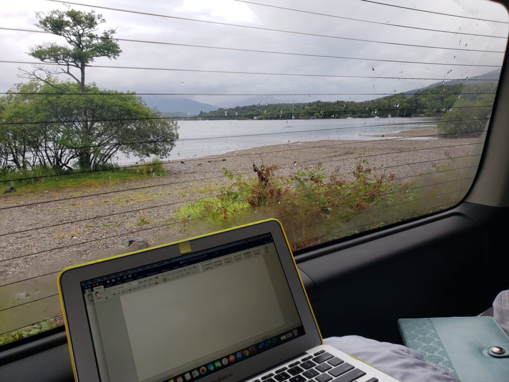 Using technology (laptop) while traveling in a van
