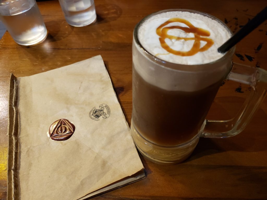 Harry Potter Cafe in Vietnam; butterbeer and menu on table