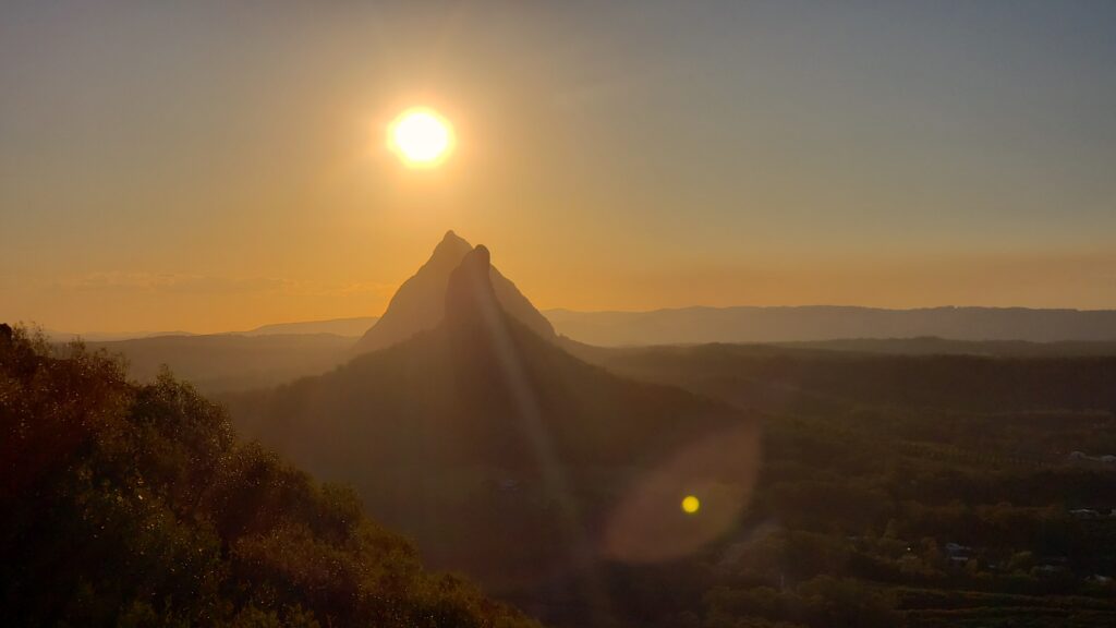 Sunset at the Glasshouse Mountains, a worthy detour off the East Coast road trip route 